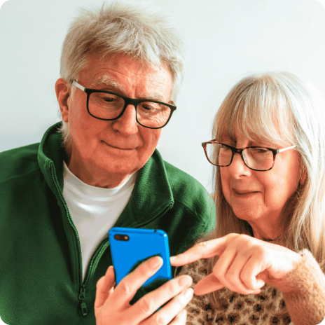 Elderly couple with phone